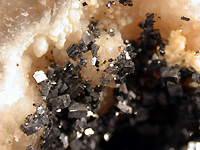 Moroccan galena"crushed" stuck inside a geode of chalcedony