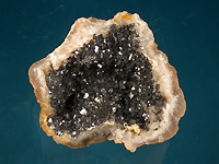 Moroccan galena"crushed" stuck inside a geode of chalcedony