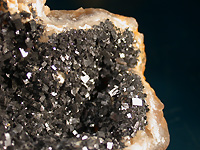 Moroccan galena"crushed" stuck inside a geode of chalcedony